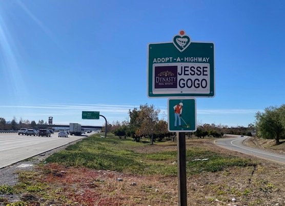 Jesse Gogo Adopt-A-Highway sign beside the I-15 southbound Summit Avenue off-ramp.