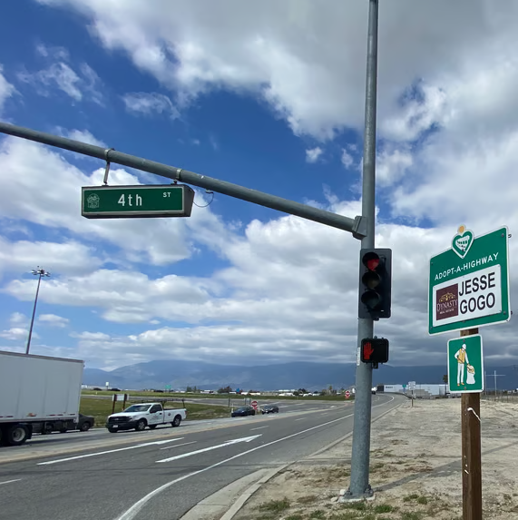 Jesse Gogo Adopt-A-Highway sign at Fourth St (Ontario) NB ONLY